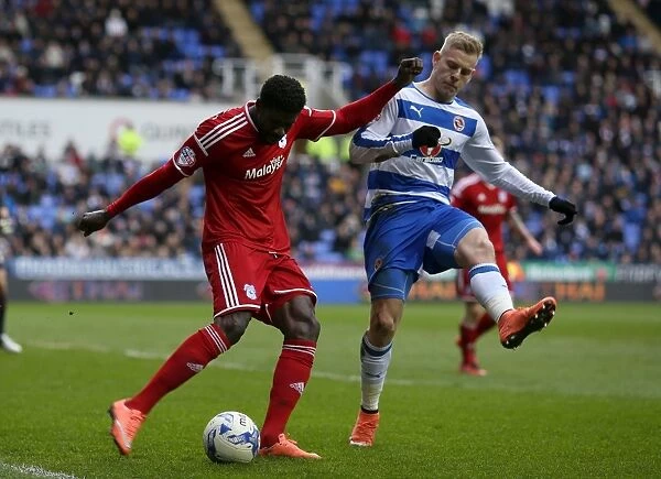 Battle for the Ball: Ecuele Manga vs. Pogrebnyak in the Intense Championship Clash between Reading and Cardiff City