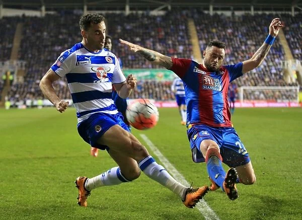 Battle for the Ball: Hal Robson-Kanu vs. Damien Delaney - FA Cup Quarterfinal Rivalry at Reading's Madejski Stadium
