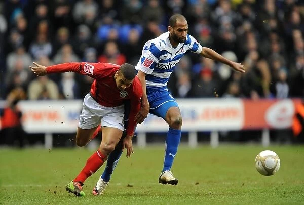 A Battle for the Ball: Jimmy Kebe vs. Gianni Zuiverloon - Reading vs. West Bromwich Albion, FA Cup Fifth Round