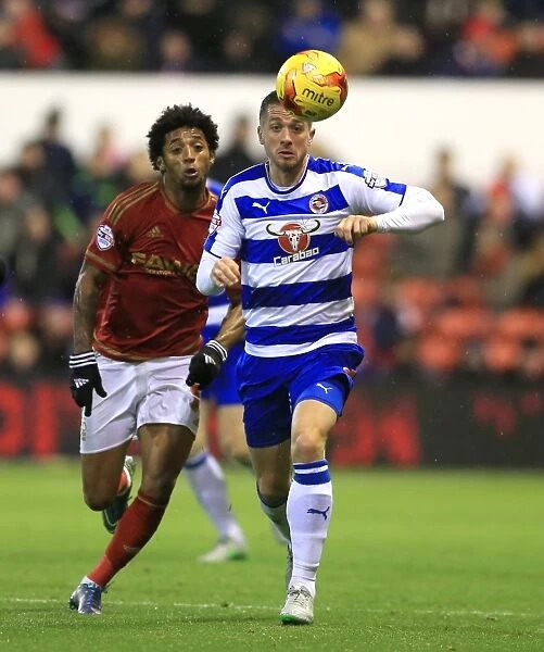 Battle for the Ball: Mendes De Graca vs. Taylor in Nottingham Forest vs. Reading Championship Clash at City Ground