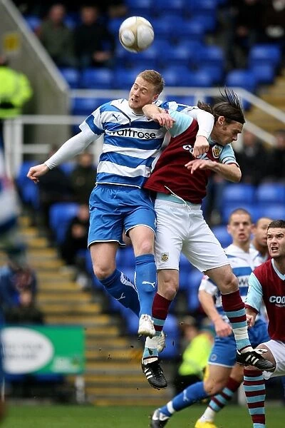Battle for the Ball: A Riveting Moment between Graham Alexander and Matthew Mills in Reading's FA Cup Clash against Burnley