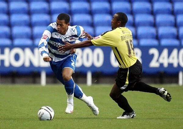 Battle for the Ball: Rosenior vs Maghoma in Reading's Carling Cup Clash