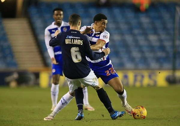 Battle for the Ball: Williams vs. Blackman in the Intense Millwall vs. Reading Championship Clash