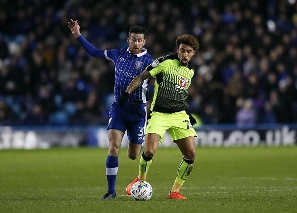 Battle for Supremacy: David Jones vs. Daniel Williams in the Sky Bet Championship Clash between Sheffield Wednesday and Reading at Hillsborough