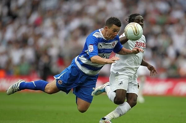 Battle at Wembley: Harte vs. Dyer - Reading vs. Swansea City in the Npower Championship Play-Off Final: A Clash of Titans