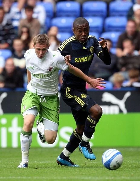 A Clash of Colors: Salomon Kalou vs. Simon Church in Reading FC's Pre-Season Friendly Against Chelsea