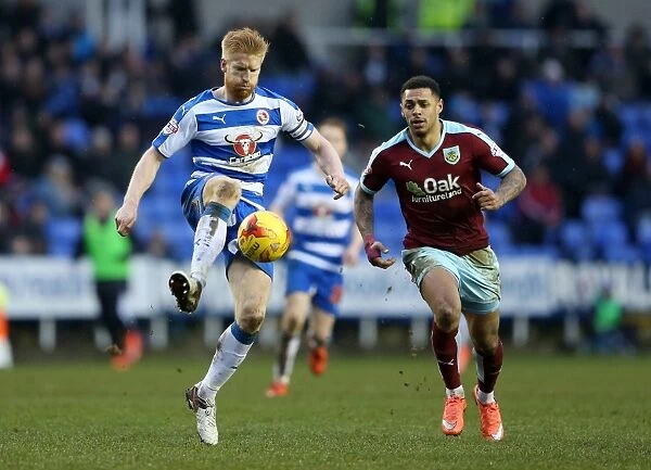 Clash between McShane and Gray: A Tense Moment in the Reading vs. Burnley Championship Match at Madejski Stadium