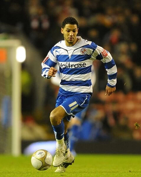 Determined Jobi McAnuff at Anfield: Reading FC's FA Cup Third Round Replay Battle against Liverpool