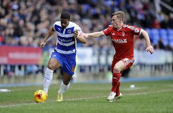 Exciting Escape: Garath McCleary Outmaneuvers Ben Osborn in Thrilling Reading vs. Nottingham Forest Championship Clash