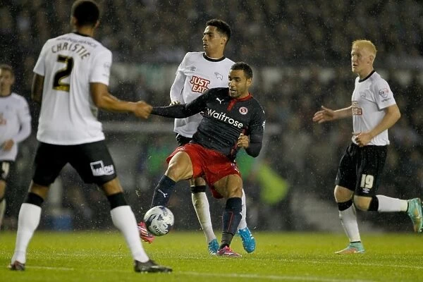 Hal Robson-Kanu Surrounded by Derby County Defenders in Intense Capital One Cup Clash at iPro Stadium