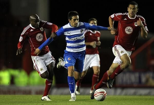 Intense Rivalry: Jem Karacan vs. Jamal Campbell-Ryce - A Battle in the Npower Championship between Reading and Bristol City at Ashton Gate