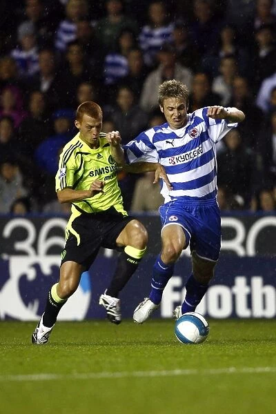 Kevin Doyle holds of former Reading player Steve Sidwell