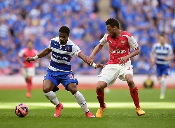McCleary vs. Coquelin: A Battle for the Ball in the FA Cup Semi-Final at Wembley Stadium