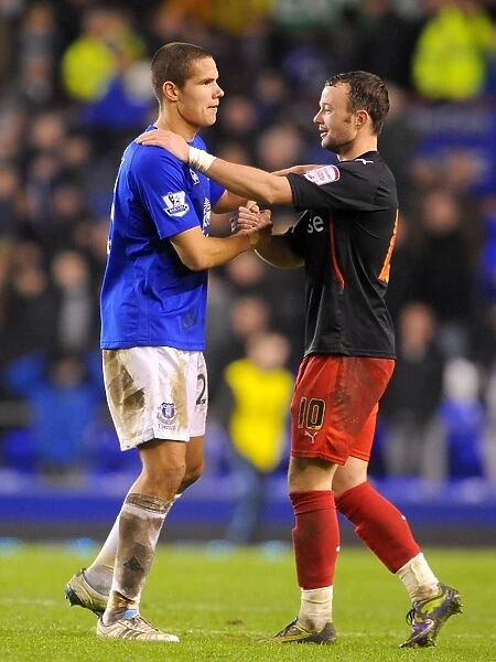 A Moment of Reunion: Jack Rodwell and Noel Hunt at Goodison Park After the FA Cup Fifth Round Clash