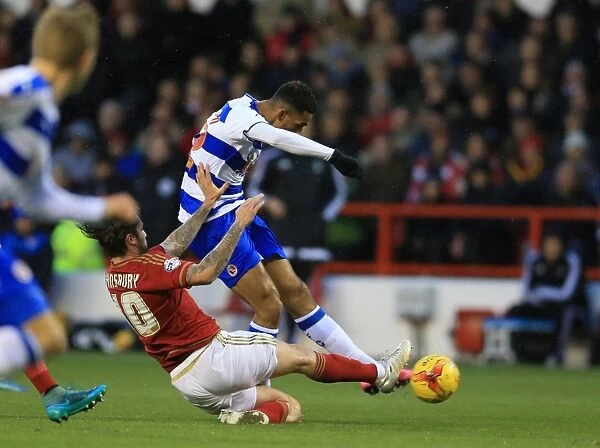 Nick Blackman vs. Henri Lansbury: A Tense Face-Off in Reading's Sky Bet Championship Clash at Nottingham Forest's City Ground