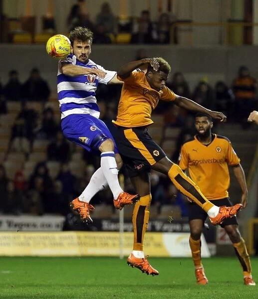 Orlando Sa Fights for the Header: Wolverhampton Wanderers vs. Reading - Sky Bet Championship, Molineux
