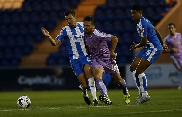 Orlando Sa vs. Gilbey and Wynter: A Fierce Face-Off in the Capital One Cup Clash between Colchester United and Reading