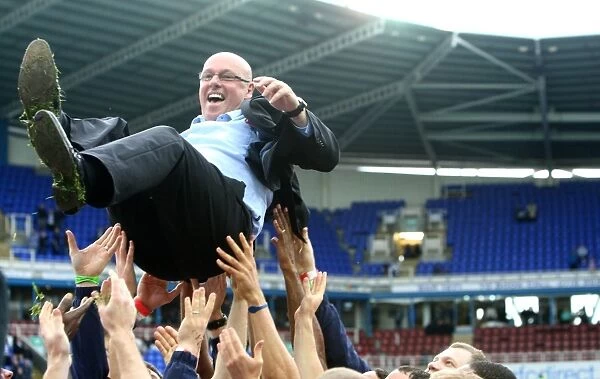 Reading FC: Celebrating Promotion - Emotional Lift: Brian McDermott Surrounded by Jubilant Players