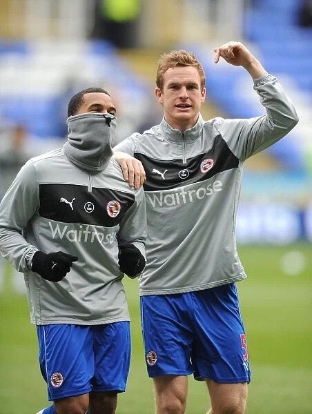 Reading FC: Mariappa and Pearce Sharing a Chilly Laugh During Warm-Up vs. Wigan Athletic (Barclays Premier League, Madjeski Stadium, 23-02-2013)