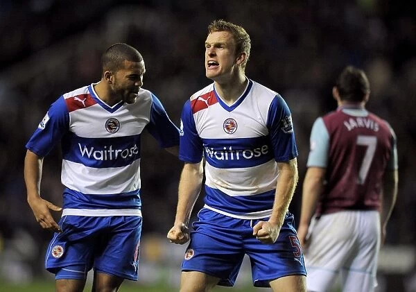Reading FC's Alex Pearce and Adrian Mariappa Celebrate Thrilling Victory Over West Ham United at Madjeski Stadium (December 29, 2012)