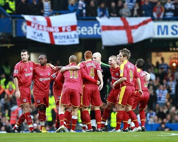 Reading players break from the huddle before the 2-2 draw against Chelsea at Stamford Bridge