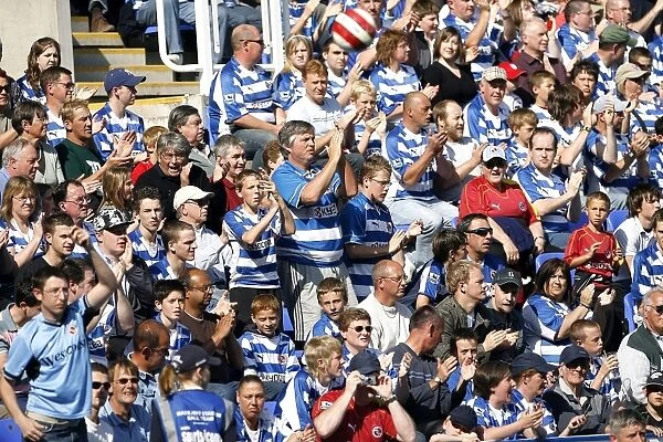 Royals Fans applaud in the sunshine against Watford