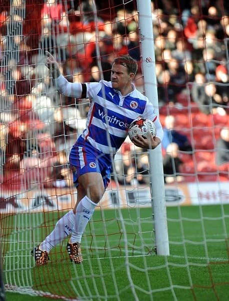 Simon Cox's Stunner: Reading's Historic First Goal at Brentford's Griffin Park