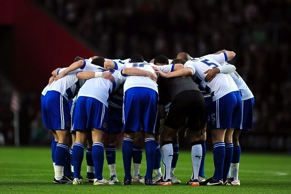 United in Focus: Reading FC's Pre-Match Huddle at St. Mary's Stadium vs Southampton
