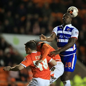 Aiyegbeni Yakubu Heads the Ball for Reading in Sky Bet Championship Match