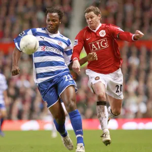 Andre Bikey holds off Ole Gunnar Solskjaer at Old Trafford