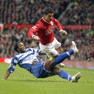 Andre Bikey tackles Cristiano Ronaldo at Old Trafford in the FA Cup 5th Round