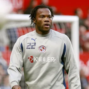 Andre Bikey warms up at Old Trafford