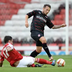 Battle for the Ball: A Clash Between Greg Cunningham and Adam Le Fondre in the Pre-Season Friendly between Bristol City and Reading