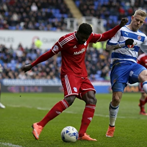 Battle for the Ball: Ecuele Manga vs. Pogrebnyak in the Intense Championship Clash between Reading and Cardiff City