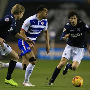 Battle for the Ball: Harding vs. Blackman in the Intense Championship Clash between Millwall and Reading