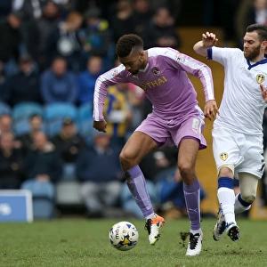 Battle for the Ball: Hector vs. Antenucci in the Intense Championship Clash between Leeds United and Reading at Elland Road
