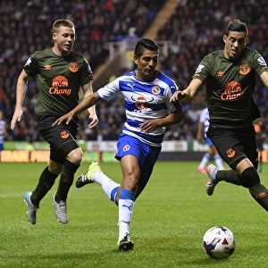 Battle for the Ball: Hurtado, Funes Mori, and McCarthy's Intense Rivalry in the Capital One Cup Clash at Reading's Madejski Stadium