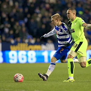 Battle for the Ball: Matej Vydra vs. Joel Lynch in the Emirates FA Cup Third Round Replay Showdown between Reading and Huddersfield Town