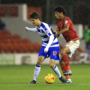 Battle for the Ball: Mendes De Graca vs. Piazon - Championship Clash between Nottingham Forest and Reading