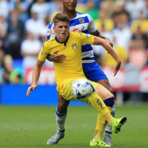 Battle for the Ball: Obita vs. Byram in the Intense Sky Bet Championship Clash between Reading and Leeds United
