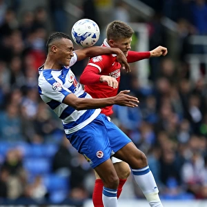 Battle for the Ball: Obita vs. Gudmundsson in the Intense Sky Bet Championship Clash between Reading and Charlton Athletic