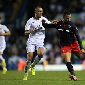 Battle for the Ball: Tommaso Bianchi vs. Hal Robson-Kanu in the Intense Sky Bet Championship Clash at Elland Road