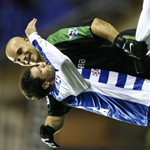 Celebrating Victory: Murty and Hahnemann's Jubilant Moment after Reading's FA Premiership Win Against Charlton Athletic (November 18, 2006)