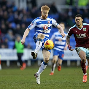 Clash between McShane and Gray: A Tense Moment in the Reading vs. Burnley Championship Match at Madejski Stadium