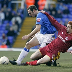 Dave Kitson tackles Birminghams Martin Taylor at St Andrews