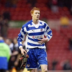 Dave Kitson walks to the away fans to give his boots away