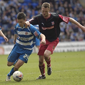 Determined Strike: Shane Long in Action for Reading Football Club