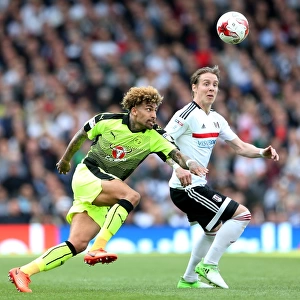 Fulham vs. Reading: Intense Clash between Danny Williams and Stefan Johansen in Sky Bet Championship Play-off First Leg at Craven Cottage