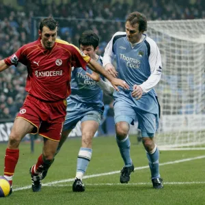 Glen Little holds off Joey Barton and Dietmar Hamann