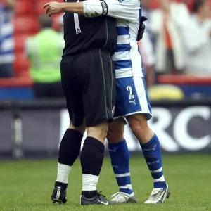 Graeme Murty and Marcus Hahnemann celebrate the win